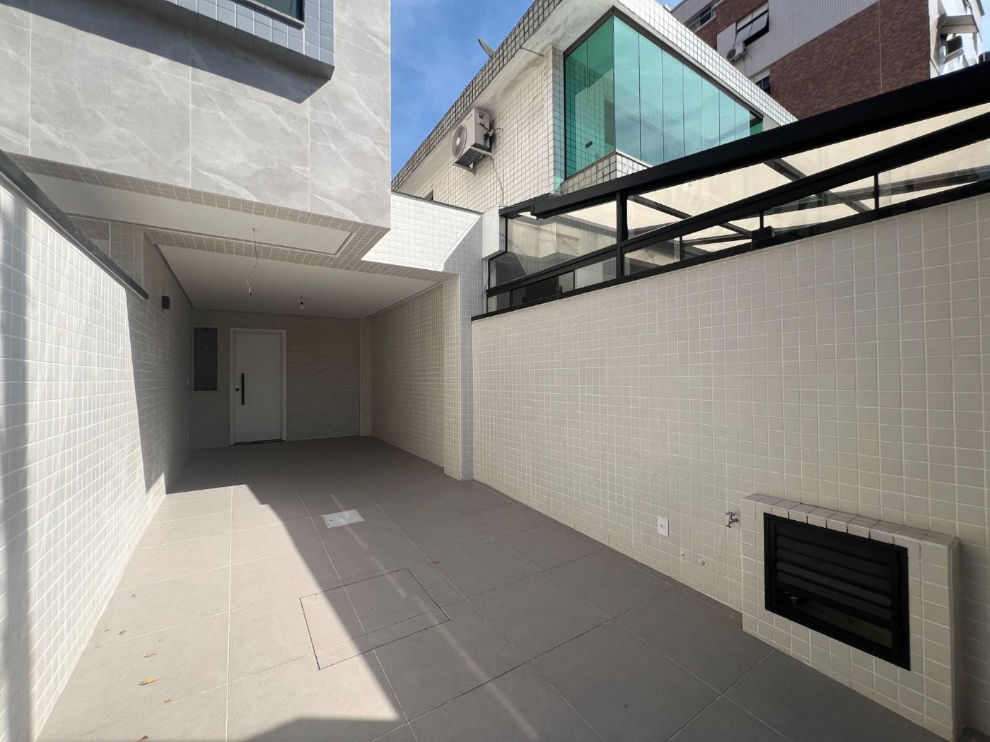 Casa com 3 dormitórios à venda, 155 m² por R$ 1.450.000,00 - Aparecida - Santos/SP