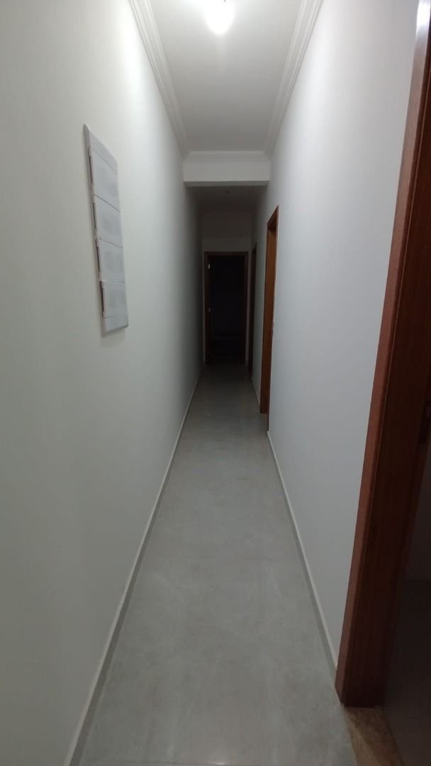 Casa com 3 dormitórios à venda, 100 m² por R$ 1.060.000,00 - Embaré - Santos/SP