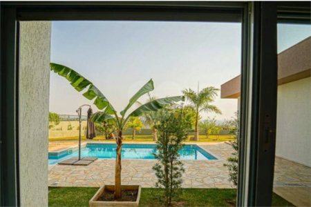 Casa à venda com 4 quartos, sendo 2 suítes, no condomínio Residencial Jardim Primavera, Louveira - SP