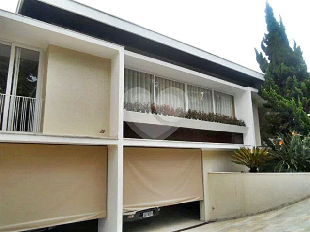 Casa à venda com 4 suítes no condomínio Chácara das Rosas, São Paulo - SP
