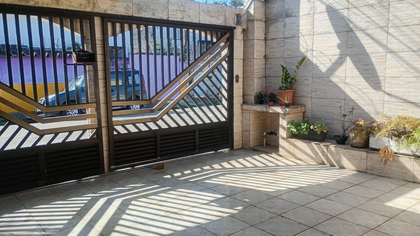 Casa com 3 dormitórios à venda, 140 m² por R$ 425.000,00 - Parque Bitaru - São Vicente/SP