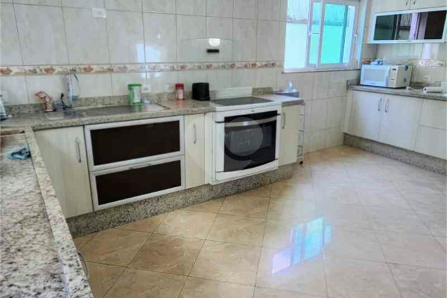 Casa à venda com 3 suítes no condomínio Quinta de Santo Antônio, São Paulo - SP