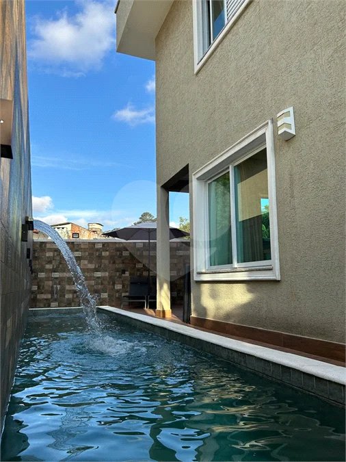 Casa à venda com 4 suítes no condomínio Residencial Jabuticabeiras, São Paulo - SP
