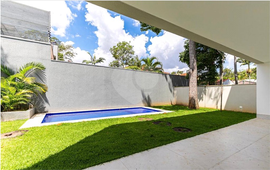 Casa à venda com 4 suítes no condomínio Hípica Garden, São Paulo - SP