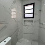 Sobrado com 4 dormitórios à venda, 234 m² por R$ 2.500.000,00 - Ponta da Praia - Santos/SP