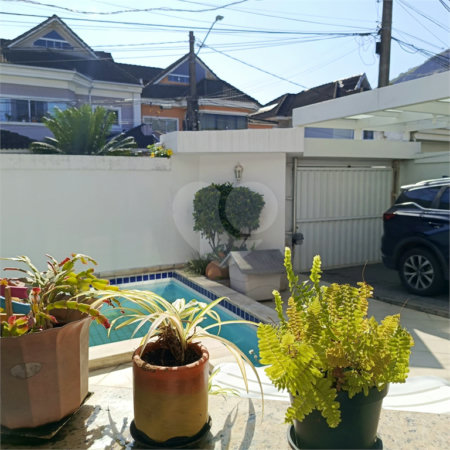 Casa à venda com 4 quartos, sendo 3 suítes, no condomínio Jardins de Florença, Rio de Janeiro - RJ