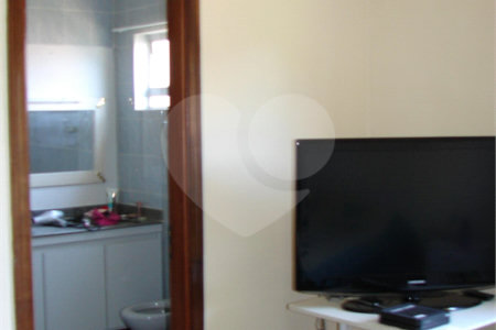 Casa à venda com 3 quartos, sendo 1 suíte, no condomínio Estância Marambaia, Vinhedo - SP