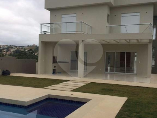 Casa à venda com 4 suítes no condomínio Santa Maria, Cotia - SP