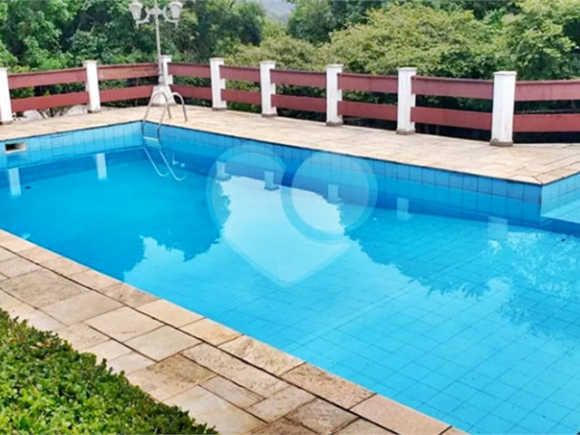 Casa à venda com 4 suítes no condomínio Alpes da Cantareira, Mairiporã - SP