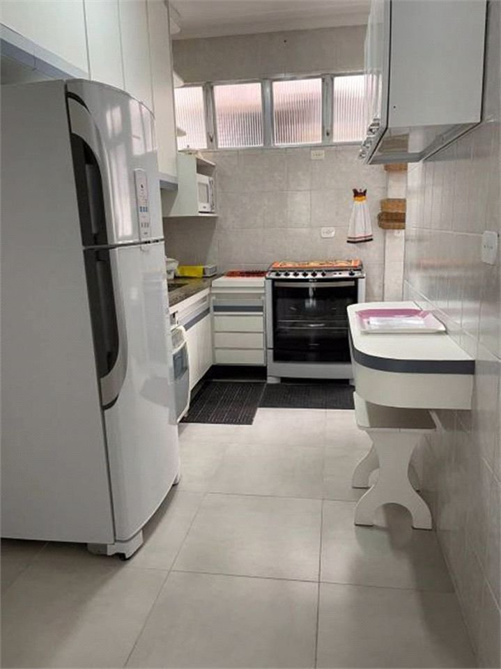 Apartamento Residencial à venda, Jardim Três Marias, Guarujá - AP1018.