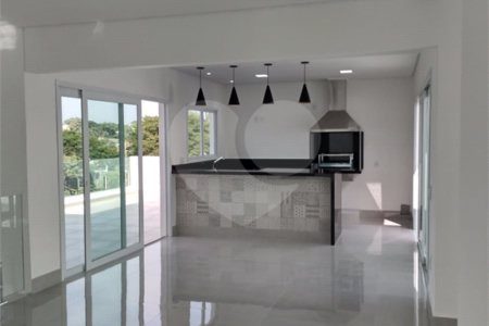 Casa à venda com 4 suítes no condomínio Estância Marambaia, Vinhedo - SP