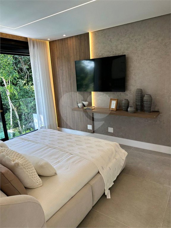Casa à venda com 6 suítes no condomínio Golf CL, Bertioga - SP