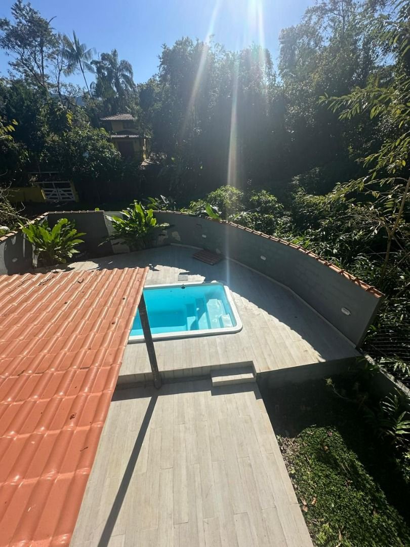 Sobrado com 3 dormitórios à venda, 269 m² por R$ 1.280.000,00 - Sertão do Camburi - São Sebastião/SP