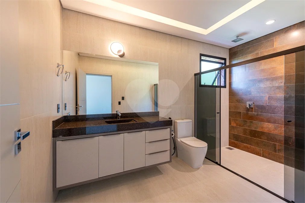 Casa à venda com 4 suítes no condomínio Vale da Santa Fé, Vinhedo - SP