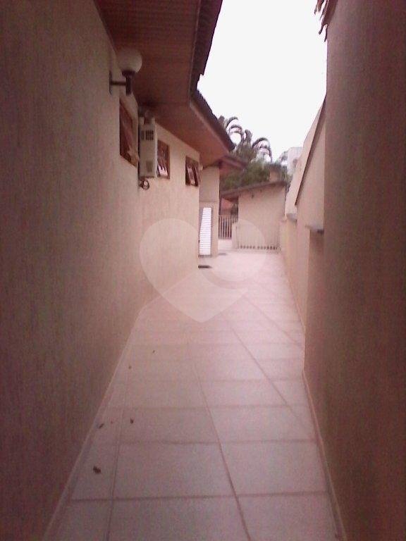 CASA TÉRREA ASSOBRADADA A VENDA NO TREMEMBÉ - 4 DORMS (2 SUÍTES), CHURRASQUEIRA E 4 VAGAS DE GARAGEM