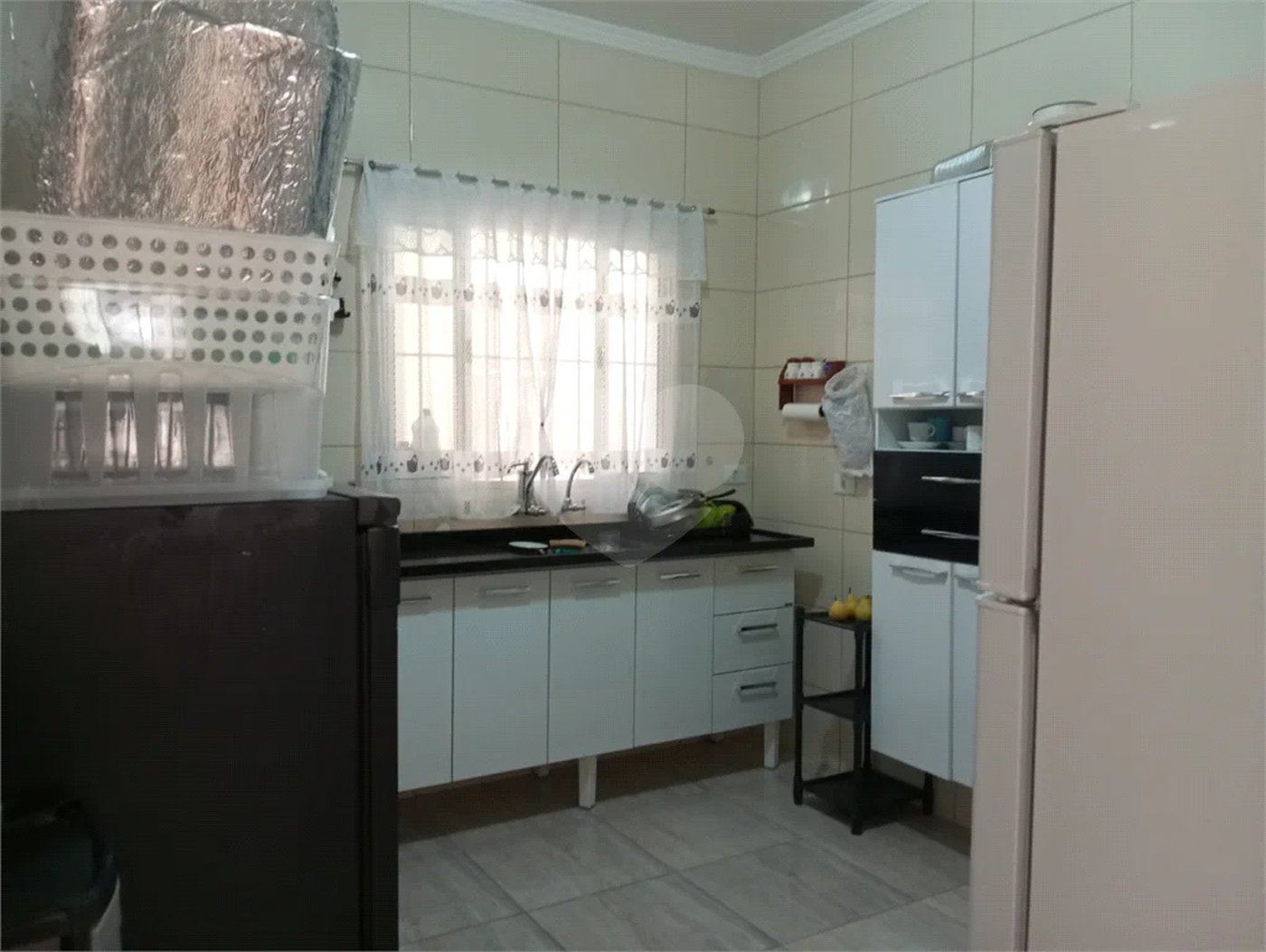 Terreno á venda com 2 casas na Vila Rosália, Guarulhos, SP.