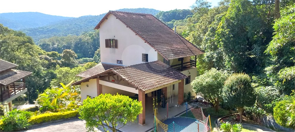 Casa à venda com 4 suítes no condomínio Alpes da Cantareira, Mairiporã - SP