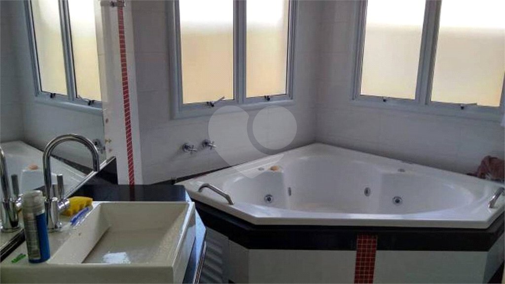 Casa à venda com 4 suítes no condomínio Jardim dos Lagos, Indaiatuba - SP