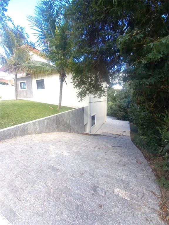 Casa à venda com 4 suítes no condomínio Estância Marambaia, Vinhedo - SP