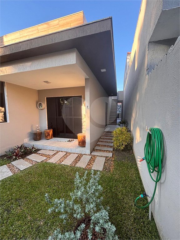 Casa à venda com 3 quartos, sendo 2 suítes, no condomínio Recanto das Palmeiras, Rio de Janeiro - RJ