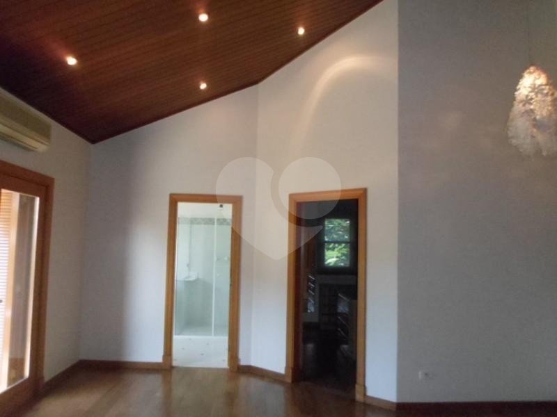 Casa à venda com 4 suítes no condomínio Jardim das Azaléias, São Paulo - SP