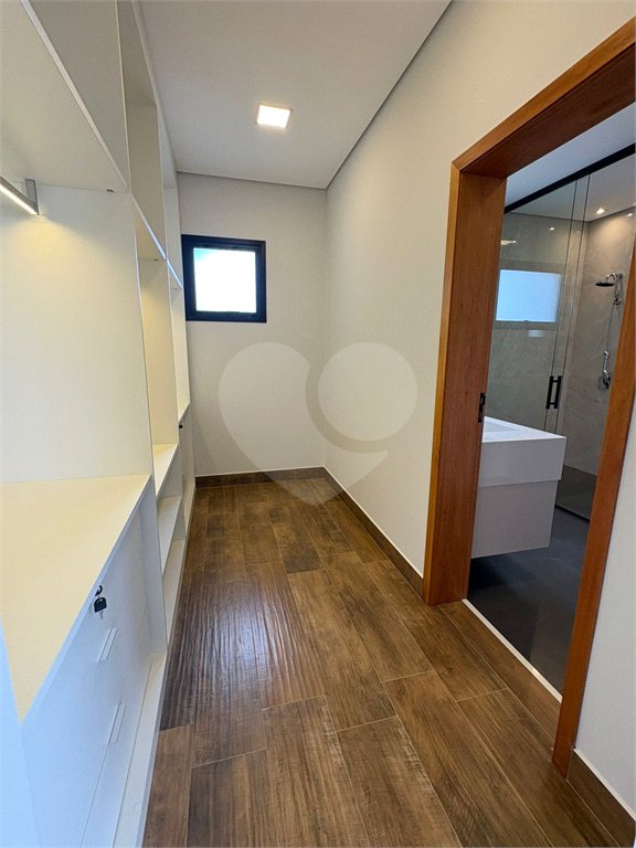 Casa à venda com 4 suítes no condomínio Portal dos Bandeirantes, Salto - SP