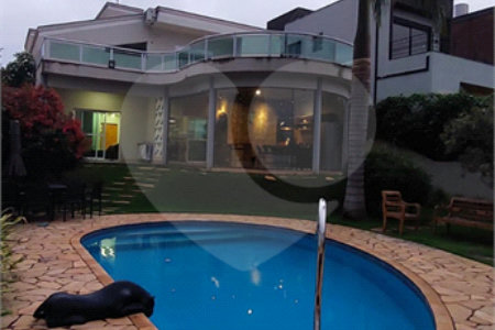 Casa para alugar com 4 quartos, sendo 3 suítes,  no condomínio Figueira Garden, Atibaia - SP
