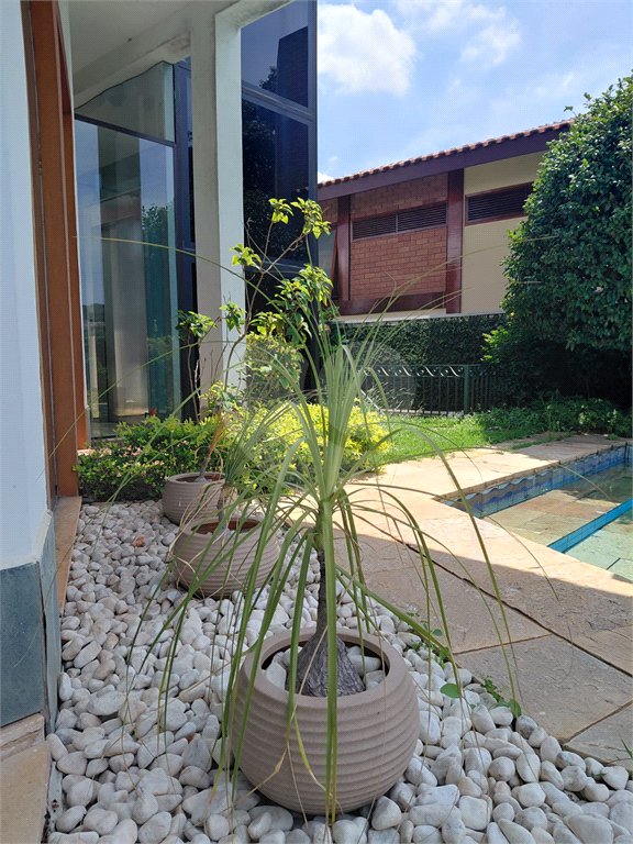Casa à venda com 4 suítes no condomínio Ville Bourghese, São Paulo - SP