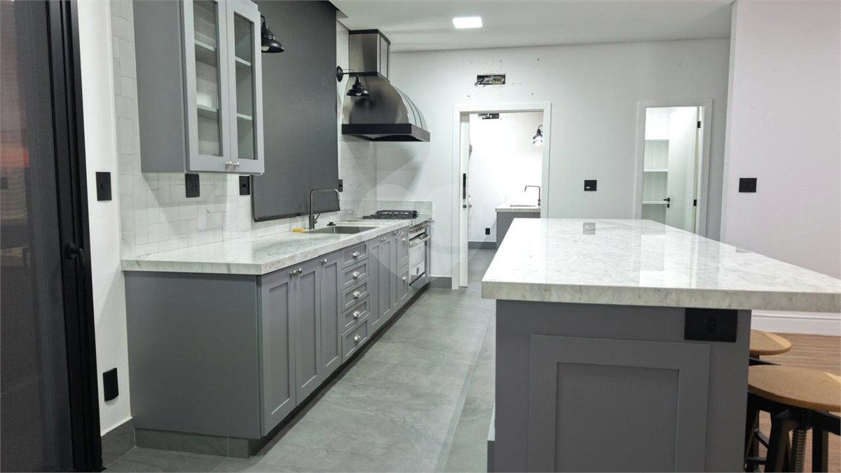 Casa à venda com 4 suítes no condomínio Alphaville Dom Pedro 3, Campinas - SP