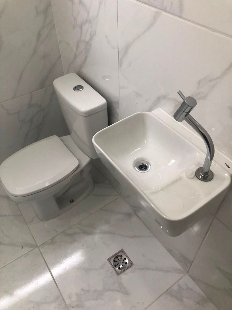 Casa com 3 dormitórios à venda, 116 m² por R$ 690.000,00 - Gonzaga - Santos/SP