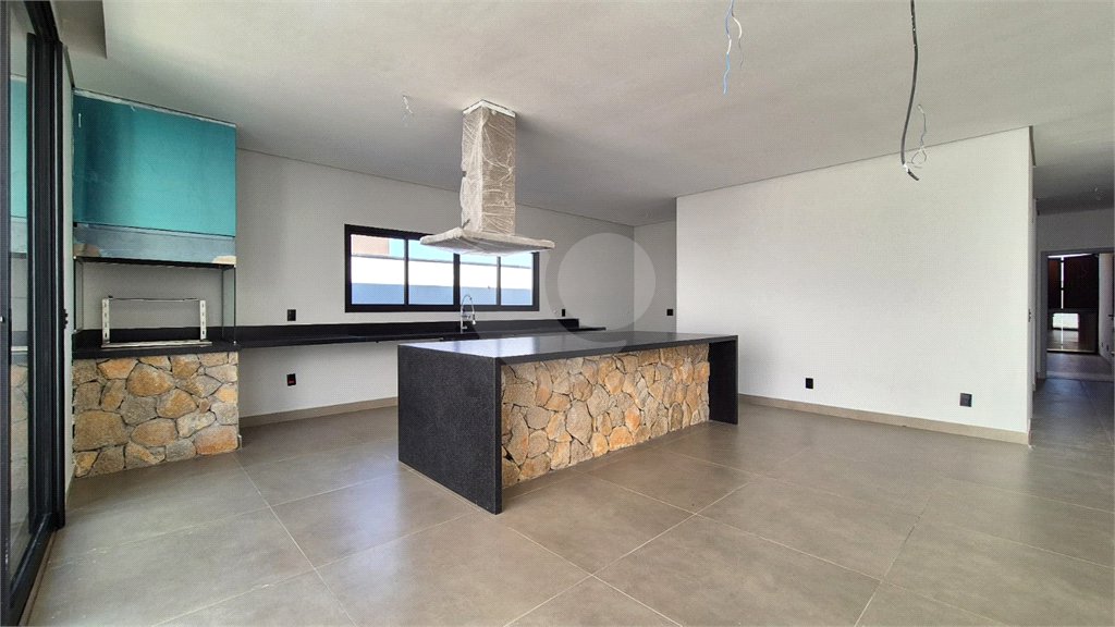 Casa à venda com 4 suítes no condomínio Alphaville Nova Esplanada 1, Votorantim - SP