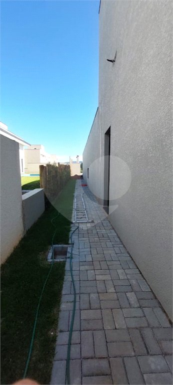 Casa à venda com 4 suítes no condomínio Figueira Garden, Atibaia - SP