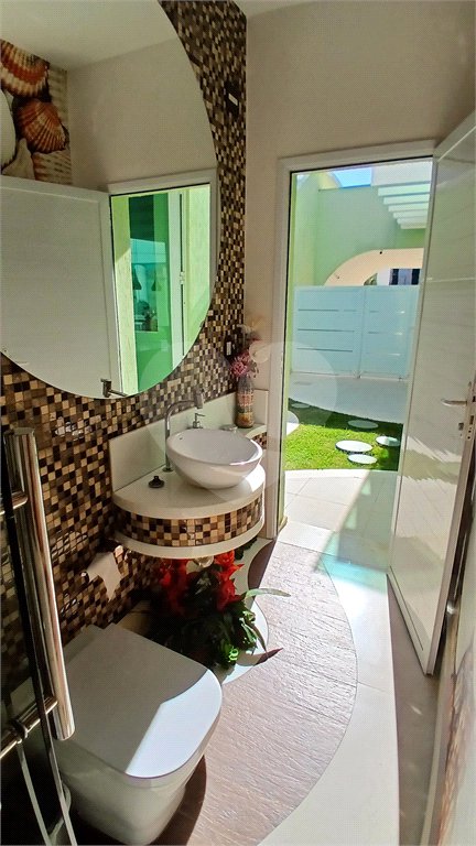 Casa à venda com 3 suítes no condomínio Figueira Garden, Atibaia - SP