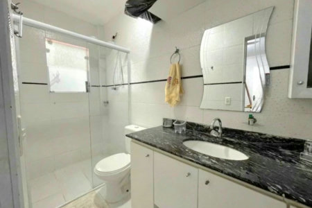 Casa com 3 dormitórios à venda, 210 m² por R$ 1.200.000,00 - Encruzilhada - Santos/SP
