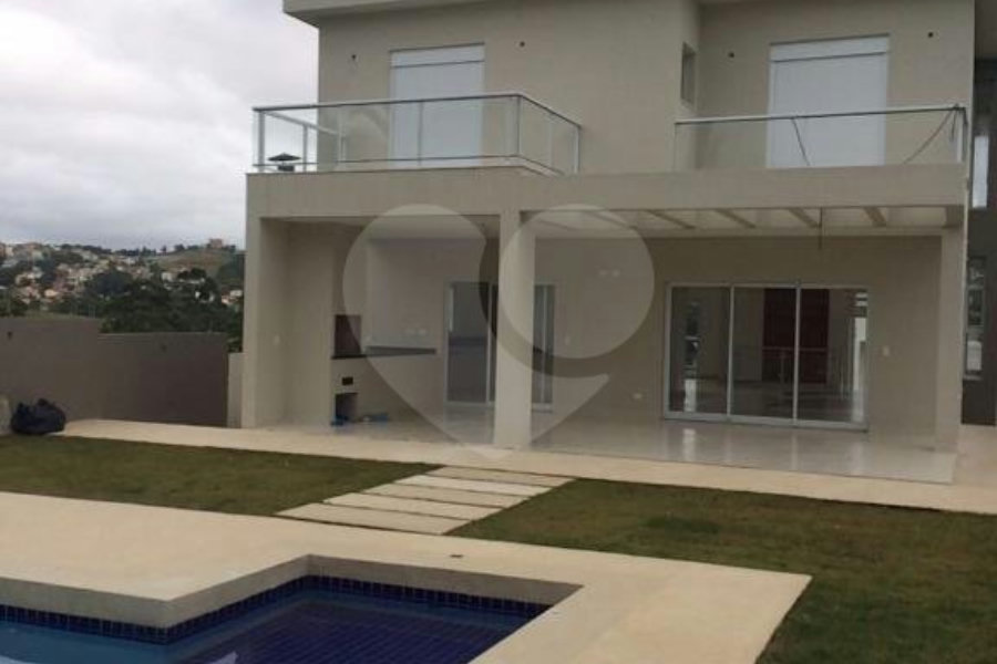 Casa à venda com 4 suítes no condomínio Santa Maria, Cotia - SP