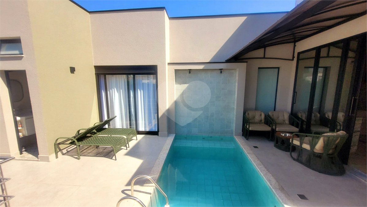 Casa à venda com 4 suítes no condomínio Sta Morriz, Campinas - SP