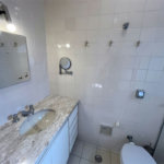 Apartamento com 4 dormitórios à venda, 259 m² por R$ 900.000,00 - Jardim Três Marias - Guarujá/SP
