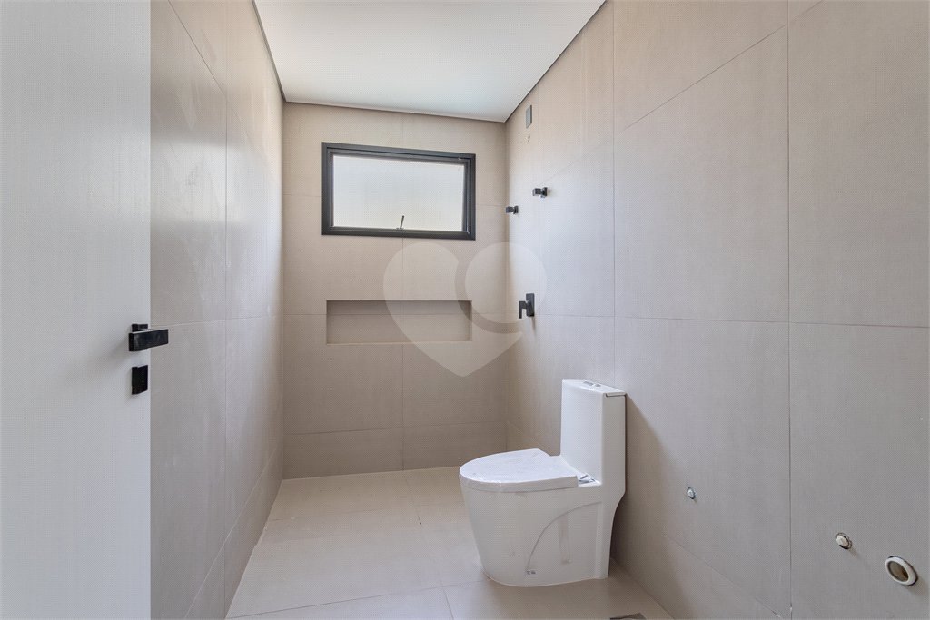 Casa à venda com 4 suítes no condomínio Villa Suiça, São Paulo - SP