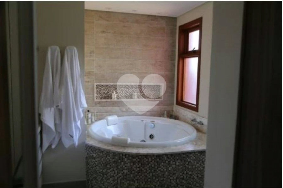 Casa à venda com 4 suítes no condomínio Suíça da Cantareira, Mairiporã - SP