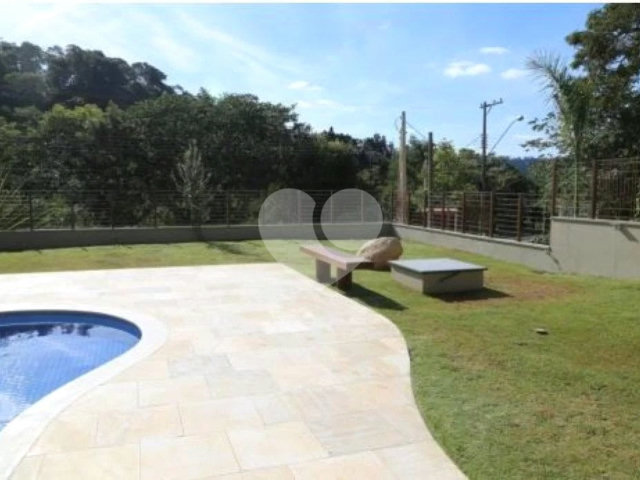 Casa à venda com 4 suítes no condomínio Suíça da Cantareira, Mairiporã - SP