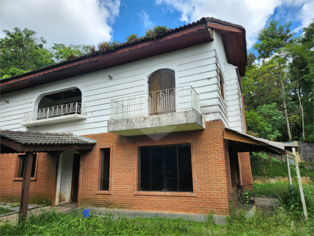 Casa à venda com 4 suítes no condomínio Alpes da Cantareira, Mairiporã - SP