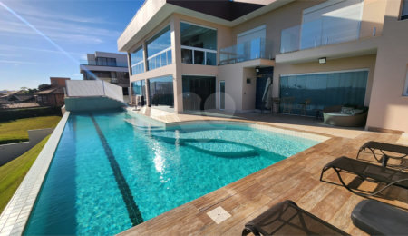 Casa à venda com 5 quartos, sendo 2 suítes,  no condomínio Residencial Jardim Primavera, Louveira - SP