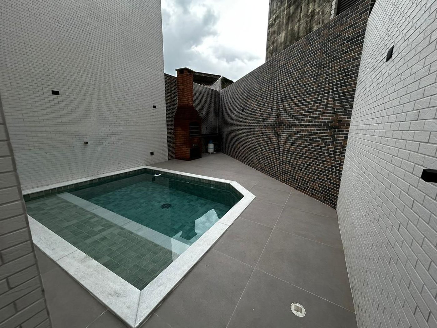 Casa com 3 dormitórios à venda, 100 m² por R$ 1.380.000,00 - Aparecida - Santos/SP