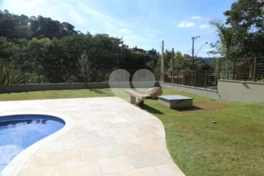 Casa à venda com 4 suítes no condomínio Suíça da Cantareira, Mairiporã - SP