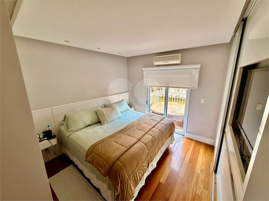 Casa à venda com 3 suítes no condomínio Villaggio Della Hípica, São Paulo - SP