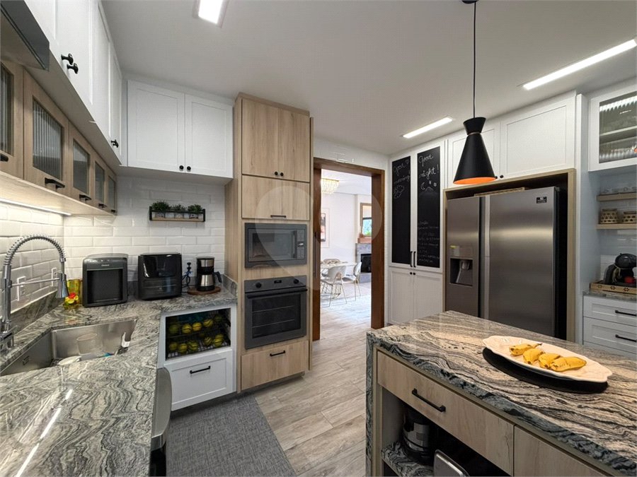 Casa à venda com 3 suítes no condomínio Palm Hill North, São Paulo - SP