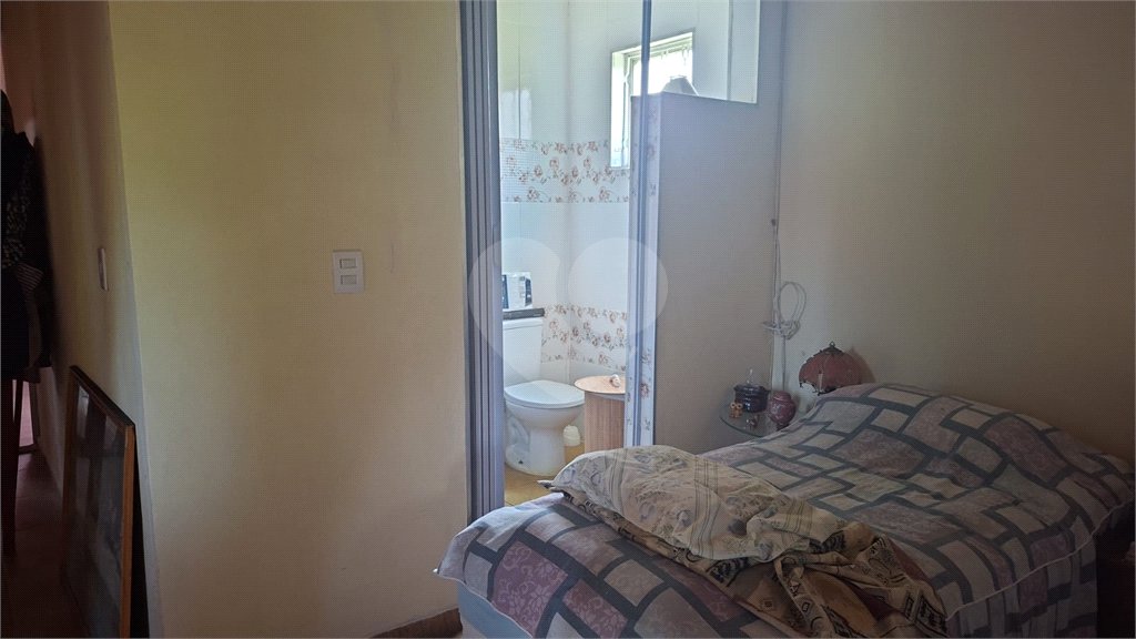 Casa à venda com 2 suítes no condomínio Portal dos Pássaros, Alambari - SP