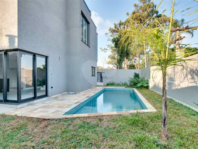 Casa à venda com 4 suítes no condomínio Reserva Robélia, São Paulo - SP