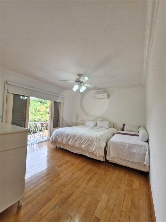 Casa à venda com 4 suítes no condomínio Estância Marambaia, Vinhedo - SP