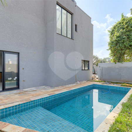 Casa à venda com 4 suítes no condomínio Reserva Robélia, São Paulo - SP